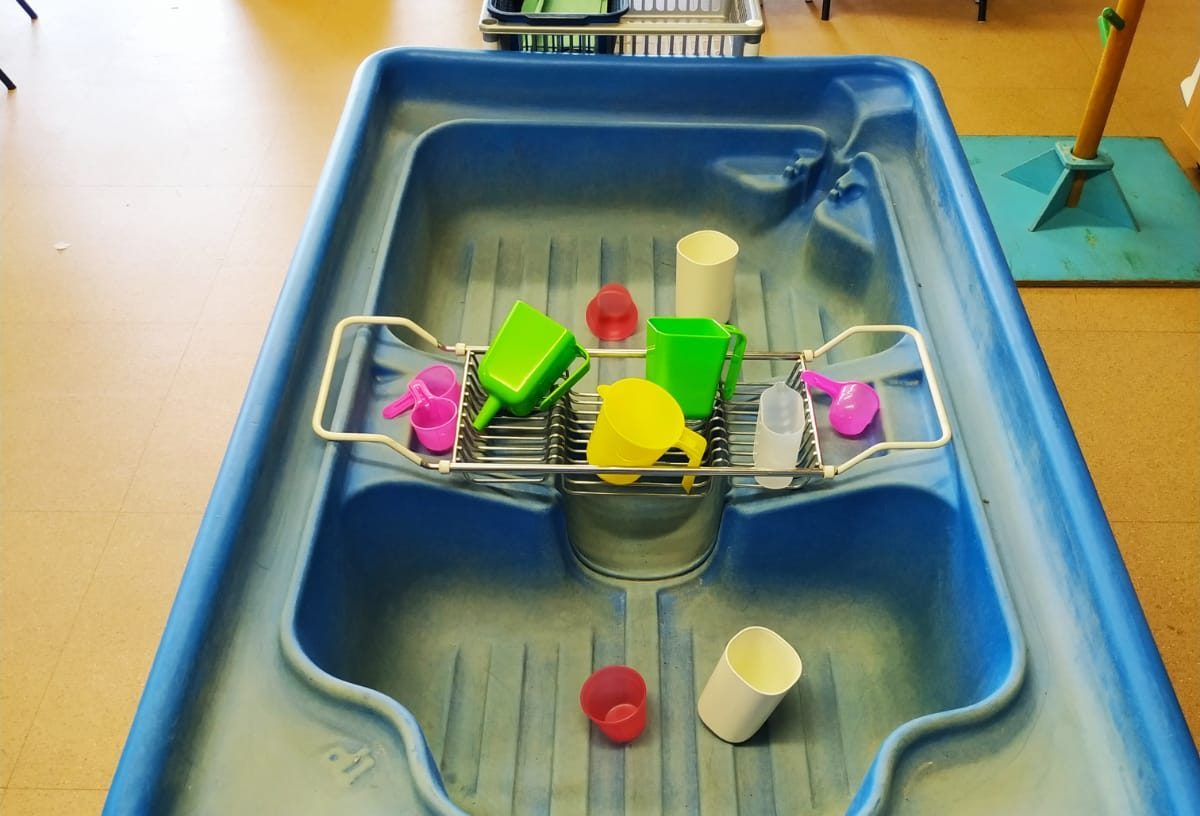 Jugs and funnels setup for water play