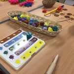 A table filled with pegs and a board